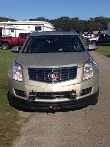 I was upset when I saw this ugly bar on the front of our new (used) car!