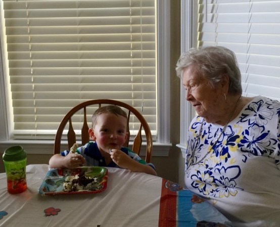 Mom at 93 and rosy cheeked Colin (from playing outside) is chowing down his 3rd birthday cake!